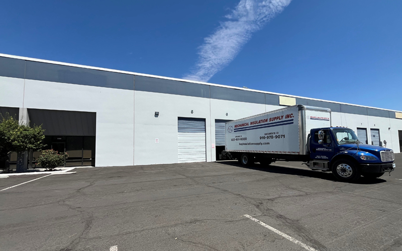 front entry of 1490 Kleppe Ln, Sparks NV with our Mechanical Insulation delivery truck parked at the garage door